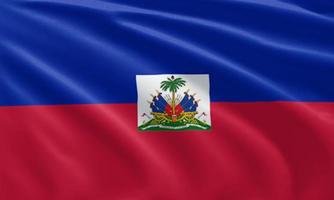 Cerrar ondeando la bandera de Haití foto