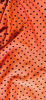 3D wave photo effects created from red orange polka dot pattern fabric