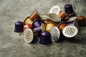 coffee capsules, used coffee pods on table ,selective focus photo