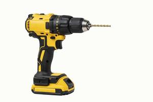 Power drill or Cordless screwdriver with battery isolated on white background with clipping path photo