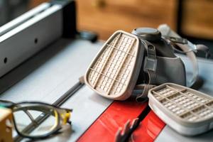 Respirator Cartridge Filter ,protection cartridge respirator on table saw ,Work safety concept photo