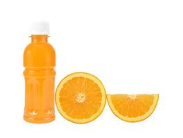 Orange fruit with Orange juice in a bottle isolated on white photo