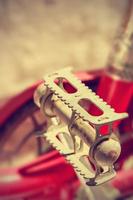 Pedal retro bike with unfocused background. Vintage style. Vertical image. photo