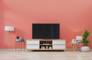 TV in modern room with decoration on living coral color wall background.