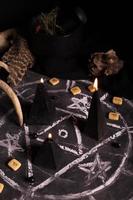 Black magic ritual with candles and runes photo