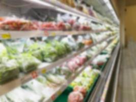 Shelf with fruits in supermarket photo