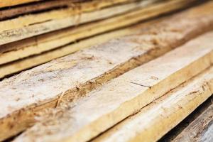 Large stack of wood planks photo