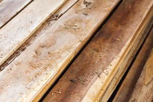 Large stack of wood planks photo