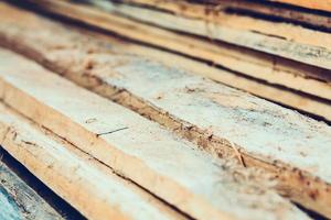 Large stack of wood planks photo