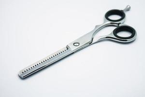 professional scissors for haircuts on white background photo