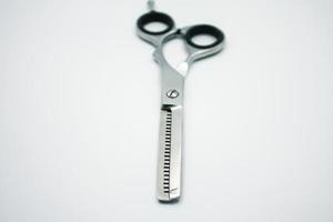 professional scissors for haircuts on white background photo
