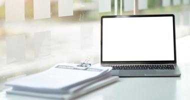 Laptop or notebook with blank screen on the floor service counter in the office. photo