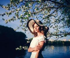 Outdoor portrait of beautiful young woman photo