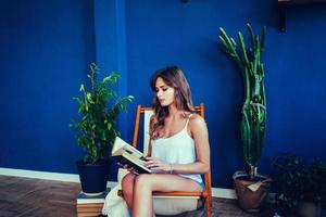 pretty woman reading a book photo