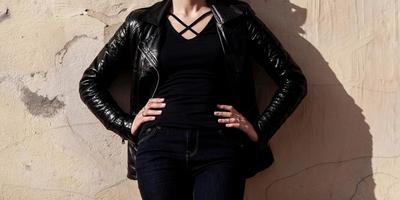 beautiful woman wearing a black rock leather photo