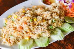 Fried rice on plate menu Asia Chinese China and thai food cuisine, Egg and vegetable fried rice healthy food photo