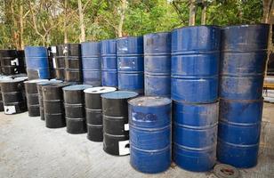 old oil barrels or chemical drums stacked up, industry oil barrel photo