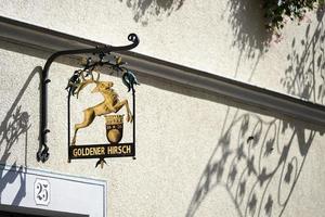 Rothenburg, Germany, 2017. Hotel Goldener Hirsch hanging sign photo