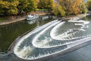 Bath, Somerset, 2015. Tour Boat near the Weir next to Pulteney Bridge photo