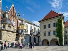 Krakow, Poland, 2017. Tourists Congregating outside Wawel Cathedral photo
