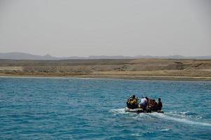 boat and snorkel in the Red Sea photo