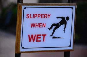 warning sign Slippery When Wet photo