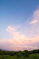 Clouds in blue sky in a clear day photo