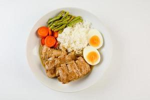 Baked pork ribs with rice, boiled egg