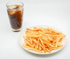 French fries on white dish and white background. photo