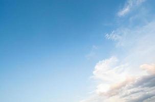 Clouds in blue sky in a clear day photo