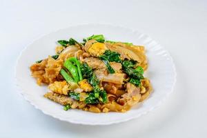 Stir-fried Fresh Rice-flour Noodles With Sliced Pork, Egg and Kale. Quick noodle stir-fry. photo