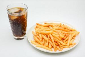 French fries on white dish and white background. photo