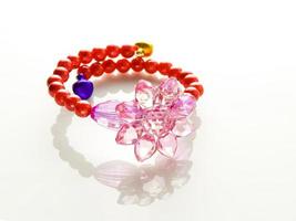 Multi-colored bracelets with beads. Colourful child's bead bracelet. photo