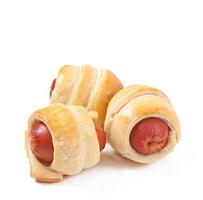 Sausages in dough isolated on white background photo