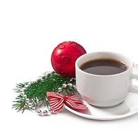 Cup of espresso coffee  and Christmas decoration photo