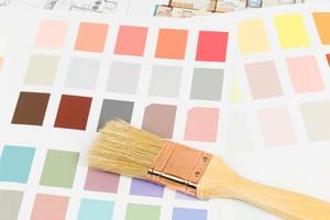 Paint color sample catalog with brush and drawing photo