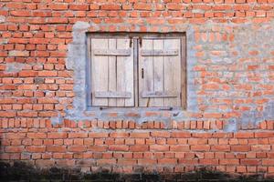 Window on brick wall grunge photo