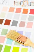 Paint color sample catalog with brush and drawing photo