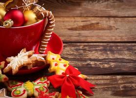 Christmas cookies on brown wooden table. Top view and mock up. Copy space. Selective focus photo