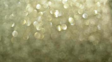 Abstract gold glister Christmas light bokeh background. photo