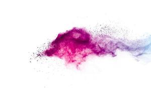 Purple blue color powder explosion cloud on white background. photo