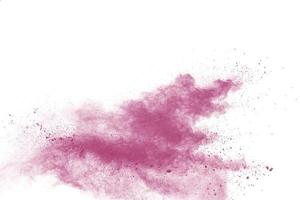 Pink dust splatter on background.Pink powder explosion on white background. photo