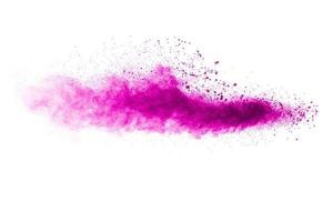 Pink dust splatter on background.Pink powder explosion on white background. photo