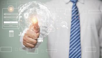 The idea for electronic knows your customer biometrics security, innovation technology against digital cybercrime. Businessman using finger scan identification to access personal security data. photo