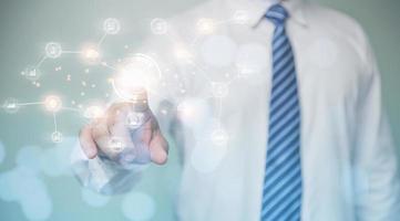 Businessman using finger scan identification to access personal security data. The idea for electronic knows your customer biometrics security, innovation technology against digital cybercrime. photo
