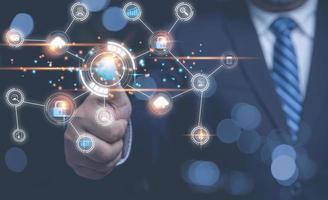 Businessman using finger scan identification to access personal security data. The idea for electronic knows your customer biometrics security, innovation technology against digital cybercrime. photo