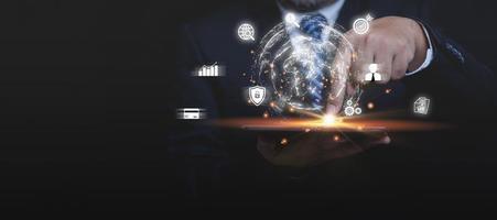 Businessman touching tablet holding on hands the virtual world digital online. For providing access to information data, innovation and technology. Internet digital networking online, business. photo