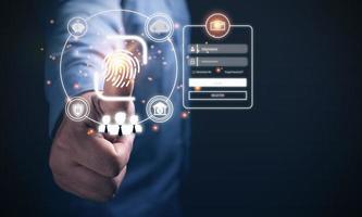Businessman scanning finger login to system protection privacy. Security technology cyber,  private data encryption, for protecting data personal using password ID. photo
