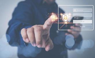 Cyber security login by password concept. User login identification personal information for the security of privacy protection data. Use password input login. Businessman touching on virtual screen. photo