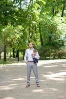 Dad walks with her daughter in the park photo